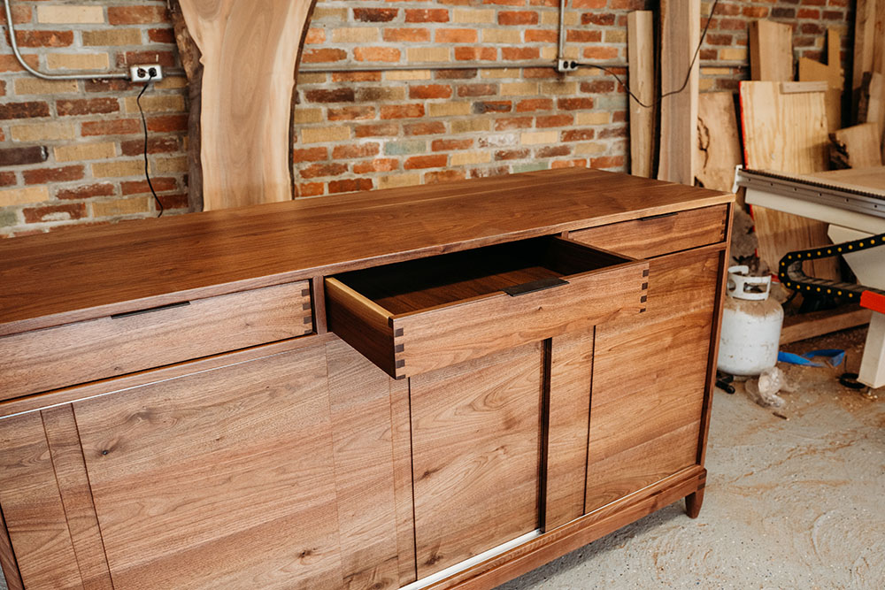 Custom Black Walnut Contemporary Solid Wood Credenza with three drawers and paneled doors - drawer open