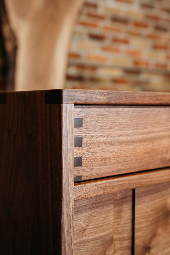 Custom Black Walnut Contemporary Solid Wood Credenza with three drawers and paneled doors - Up Close