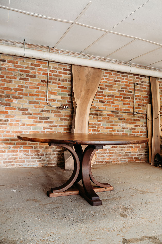 Custom Black Walnut Round Dining Table with Pedestal Arch Base and bookmatched solid wood top - 027