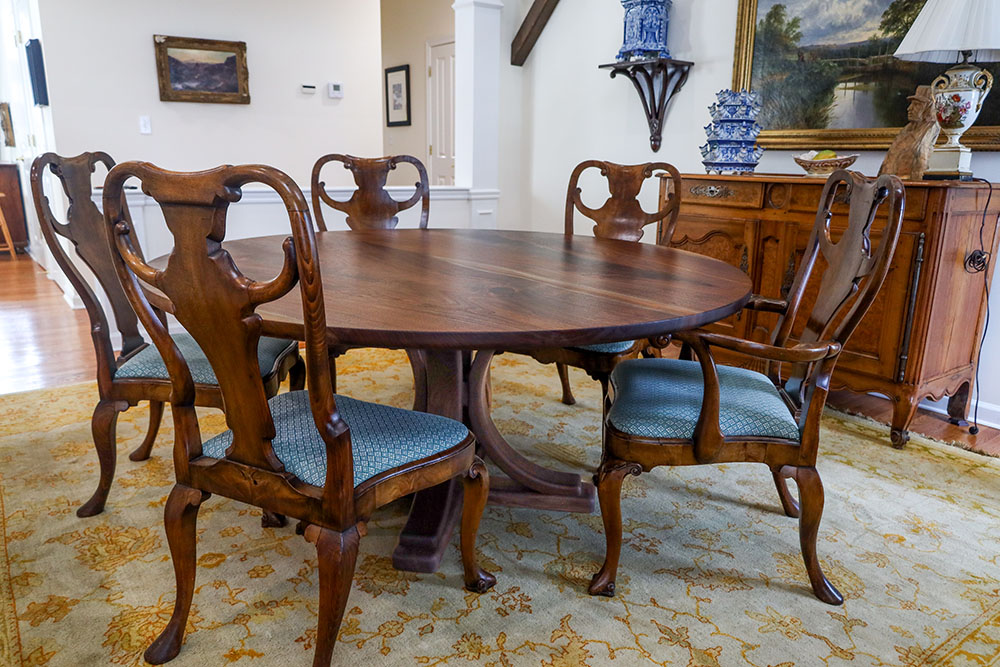 Custom Black Walnut Round Dining Table with Pedestal Arch Base and bookmatched solid wood top - 027 - in home